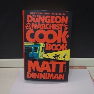 2 Hardcover Books- The Dungeon Anarchist's Cook Book And Eye Of The Bedlam Bride